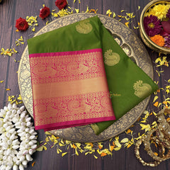 Vriksham Parrot Green With Gold Butta & Veldhaari Pink Zari Border Kanchi Silk Saree-VS4771