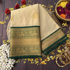 Vriksham Soft Cream With Gold Butta & Veldhaari Green Zari Border Kanchi Silk Saree-VS4770