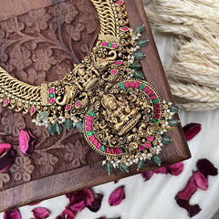 Vriksham Exquisite Jalebi Style Lakshmi Pendant Long Neckpiece-Red Green-Pastel Green Bead-G18097