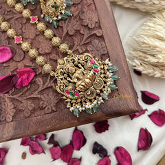 Vriksham Gold Look Alike Lakshmi Pendant Long Neckpiece-Red Green-Aqua Green Bead-G18037