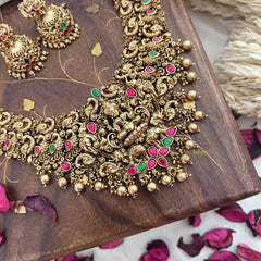 Vriksham Gold Look Alike Lakshmi With Peacock-Red Green-Gold Bead-G18139