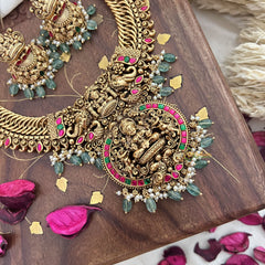 Vriksham Exquisite Jalebi Style Lakshmi Pendant Short Neckpiece-Red Green-Pastel Green Bead-G18141