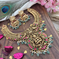 Vriksham Exquisite Jalebi Style Lakshmi Pendant Short Neckpiece-Red Green-Pastel Green Bead-G18141