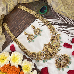 Vriksham Gold Plated Lakshmi Pendant With Peacock AD Stone Long Neckpiece-Aqua Green Bead-G19146