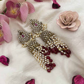 Vriksham Classic Pear Shape AD Silver Dome Jhumka Earrings-Rice Pearls-Red Bead-G20800