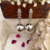 Vriksham Elegant Silver-Plated Kundan Leaf Jhumkas & Pearl Accents Earrings -G22086