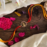 Kundan Stone Lakshmi Pendant Rakshabandhan Rakhi-Red White-G13003