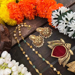 Vriksham Exquisite Matte Gold Lord Ganesha With Handcrafted Floral Jhumkas & Red Ruby Accents Long Neckpiece-G22204