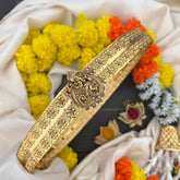 Vriksham Antique Matte Gold Ganesha Vaddanam With Embossed Floral Band Hipblet-Green Bead-G22227