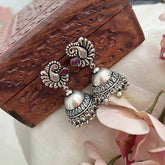 Vriksham Oxidized Silver Peacock With Red Stone Detailing Jhumka Earrings-S1070