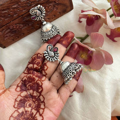 Vriksham Oxidized Silver Peacock With Red Stone Detailing Jhumka Earrings-S1070