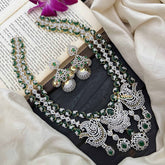 Vriksham Peacock Features Dual Rows Heart-Shaped intricately AD Diamonds Bridal Haram-Green-G20215