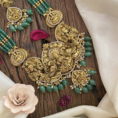 Vriksham Lakshmi With Dual Peacock AD Stone Beaded Mala-Pastel green Bead-G17336