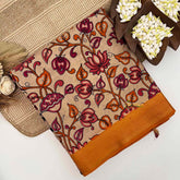 Vriksham Cream With Terracotta Red & Orange Florals Printed With Golden Zari Nizam Border Kalamkari Saree-VS5006