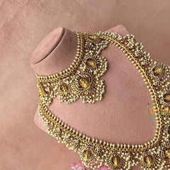 Vriksham Classic Diya With Lakshmi Pendant Pearls Detailing Guttapusalu Bridal Set-G21091