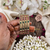 Vriksham Elegant Gold Shine Dual Tone Ruby & Emerald Stone Bangles –Set of 4-G20296