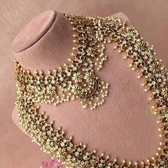 Vriksham Elegant With Premium Pearls Detailing Guttapusalu Bridal Set-G21094