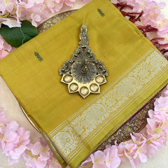 Mustard Chinnalampattu Saree with Silver Border and Green Butta - VS3667