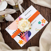 Vriksham Single Flower Bloom On White & Orange Stretchy Baby Hair Band Flower Accessories-KH1371