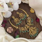 Vriksham Gold Look Alike Lakshmi Pendant Dual Peacock Hasli Choker-Pastel Green Bead-G16610