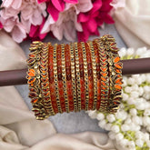 Vriksham Orange Color With Orange Lotus Kundan Side Kada Style Glass Bangle Set-G21729