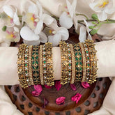 Vriksham Antique Gold Plated Floral Bangles with Emerald Green Stones Silk Bangles Set-G21737