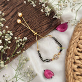 Vriksham AD Stone Round Floral With Oval Stone Mangalsutra Bracelet-Red-G18782