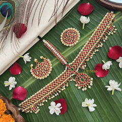 Vriksham Traditional Kemp Gold Plated Zig Zag Tikka With Chandran Suriyan-Red Green-Pearl-G19637