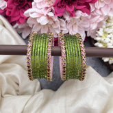 Vriksham Parrot Green Glass Bangles with Pink Star Border Bangle Set-G19846