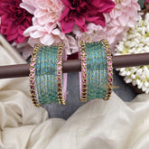 Vriksham Sky Blue Glass Bangles with Pink Star Border Bangle Set-G19845