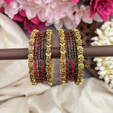 Vriksham Pushpa Pankhuri  Pink & Green Glass Bangles with Floral Gold Kada Silk Thread Bangle Set-G19849