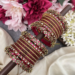 Vriksham Maroon & Gold Bridal Bangle Set with Kundan Floral Design and Sparkling Stone Silk Thread Bangle Set-G19891