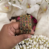 Vriksham Dual Tone Ruby & Emerald Stone Bangles –Set of 4-G19924