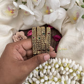 Vriksham Textured Design With Red & Green Stone Accents Bangles-Red Green-Set Of 4-G19929