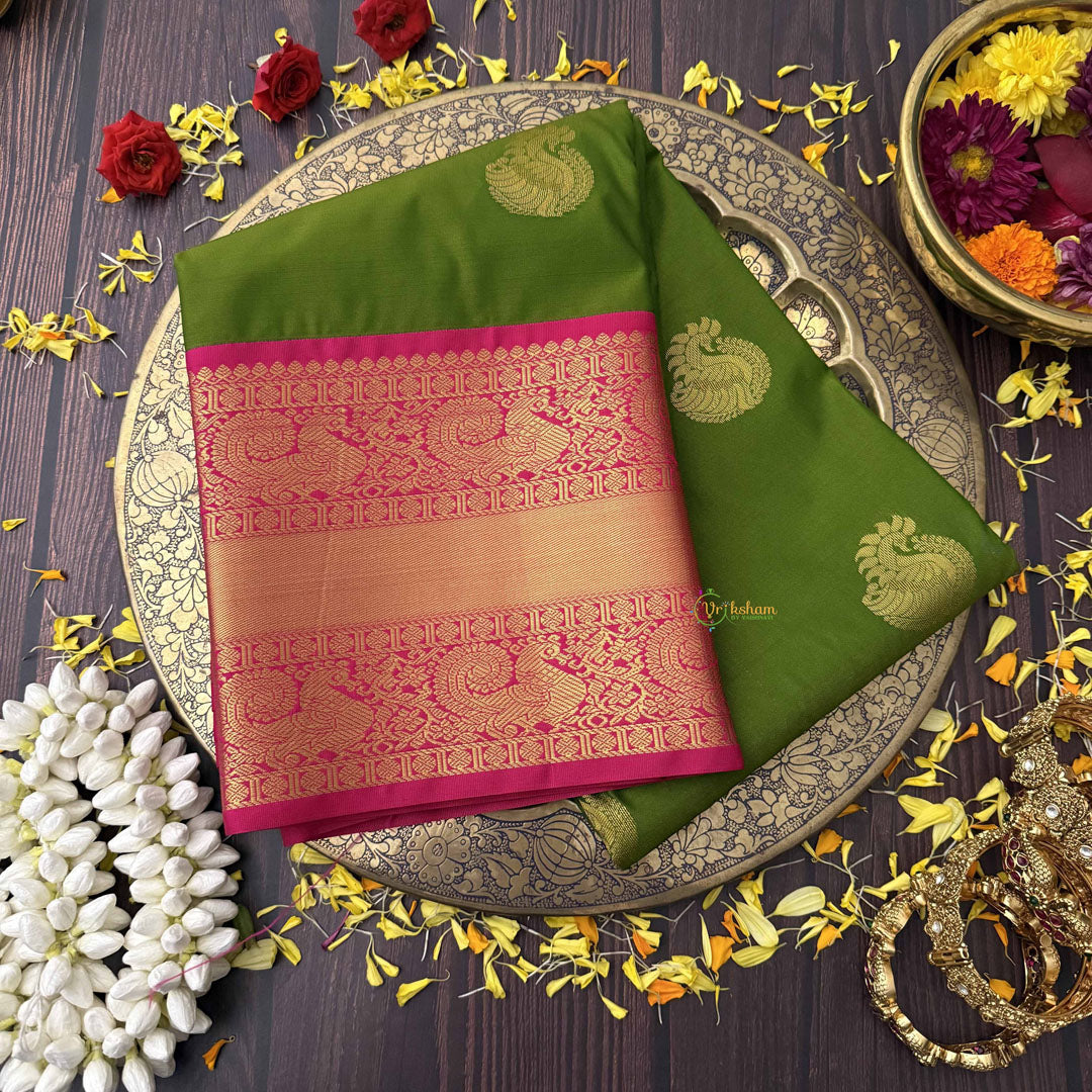 Vriksham Parrot Green With Gold Butta & Veldhaari Pink Zari Border Kanchi Silk Saree-VS4771