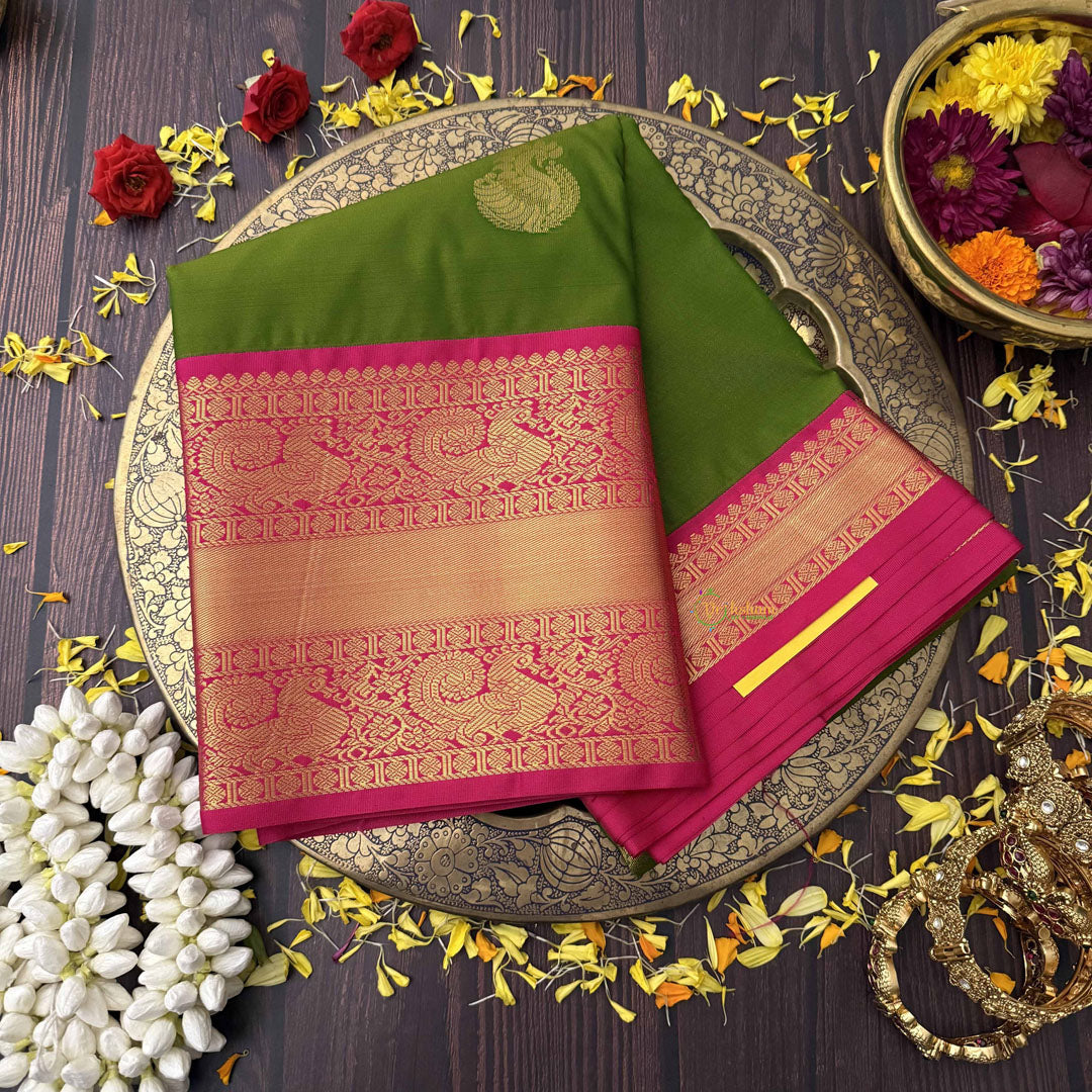 Vriksham Parrot Green With Gold Butta & Veldhaari Pink Zari Border Kanchi Silk Saree-VS4771