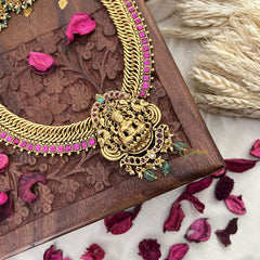 Vriksham Jalebi Style Lakshmi Pendant Long Neckpiece-Red-Pastel Green Bead-G18089