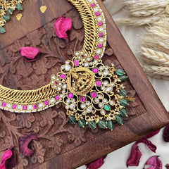 Vriksham Jalebi Style Lakshmi Pendant Long Neckpiece-Red White-Pastel Green Bead-G18090