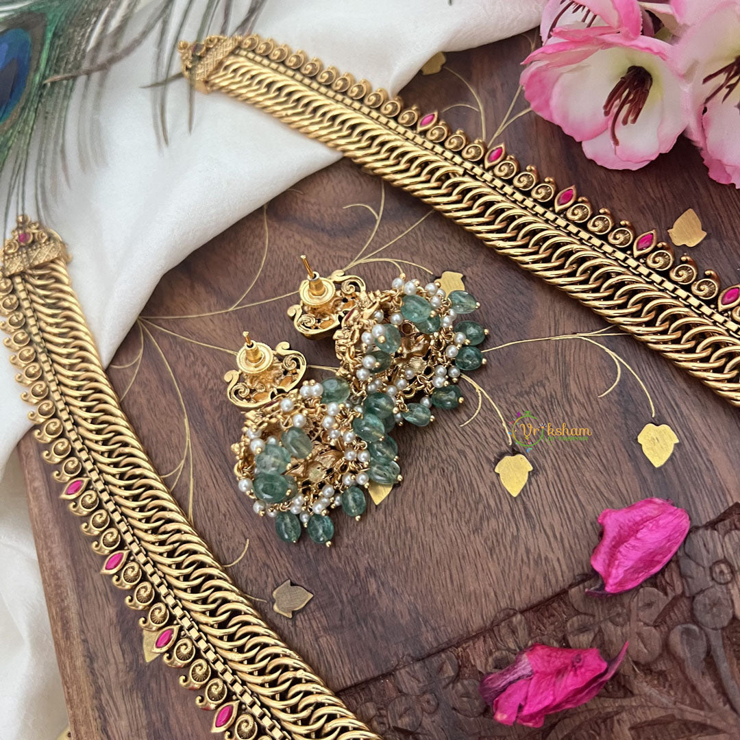 Vriksham Exquisite Jalebi Style Lakshmi Pendant Long Neckpiece-Red-Pastel Green Bead-G18101