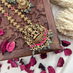 Vriksham Gold Look Alike Lakshmi Pendant Long Neckpiece-Red-Pastel Green Bead-G18043