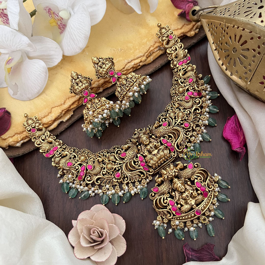 Vriksham Gold Look Alike Lakshmi Jadau Pendant Short Neckpiece-Red-Pastel Green Bead-G17848