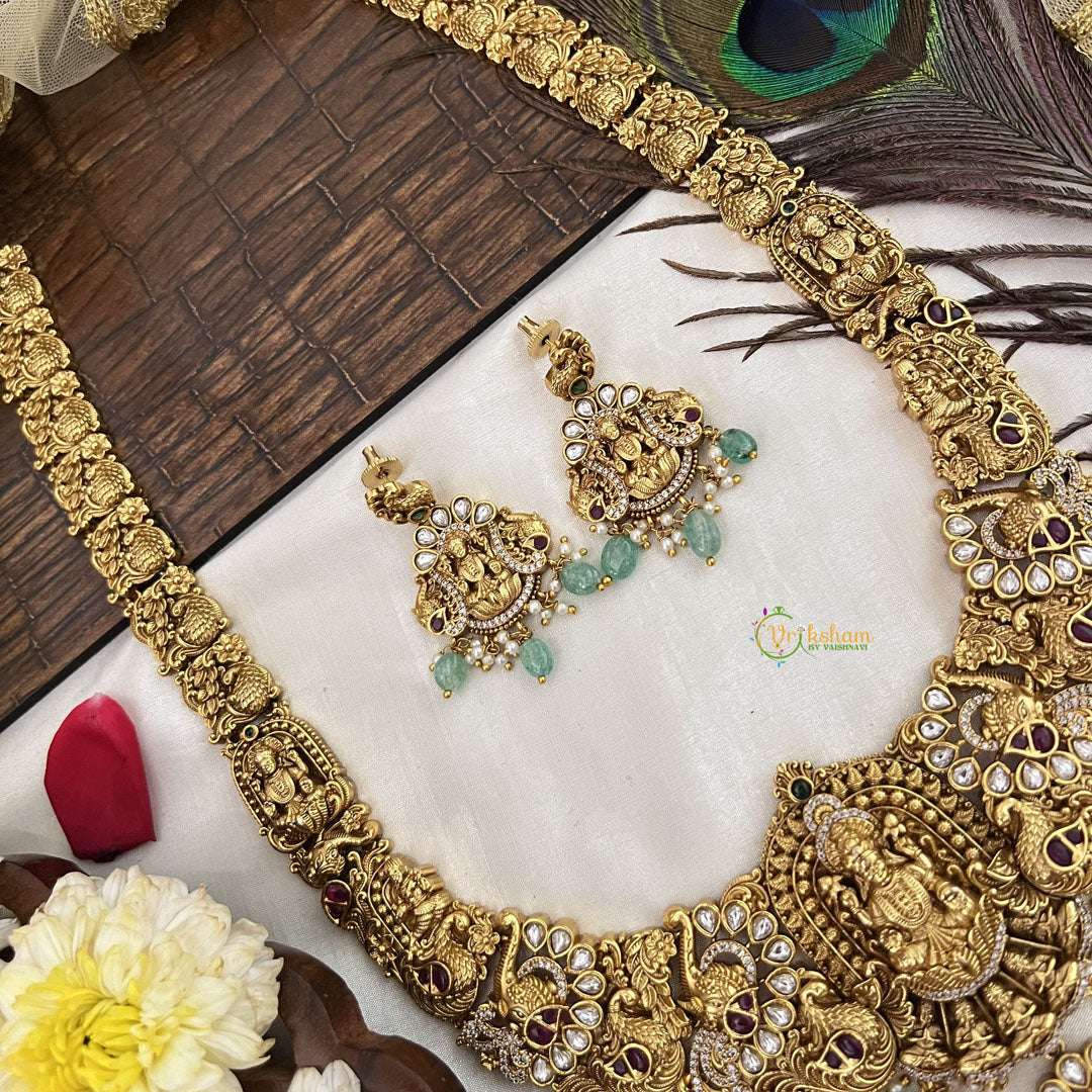 Vriksham Gold Plated Lakshmi Pendant With Peacock AD Stone Long Neckpiece-Aqua Green Bead-G19146