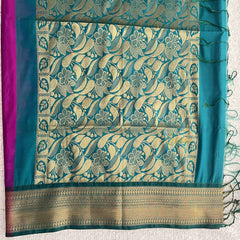 Vriksham Rani Pink With Leaf Golden Butta & Zari Work Teel Blue Border Semi Soft Silk Saree-VS4895