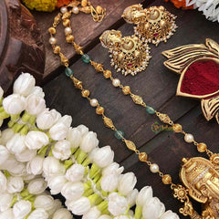 Vriksham  Exquisite Matte Gold Lord Ganesha With Handcrafted Floral Jhumkas & Red Ruby Accents Long Neckpiece-G22204