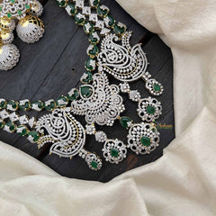 Vriksham Peacock Features Dual Rows Heart-Shaped intricately AD Diamonds Bridal Haram-Green-G20215
