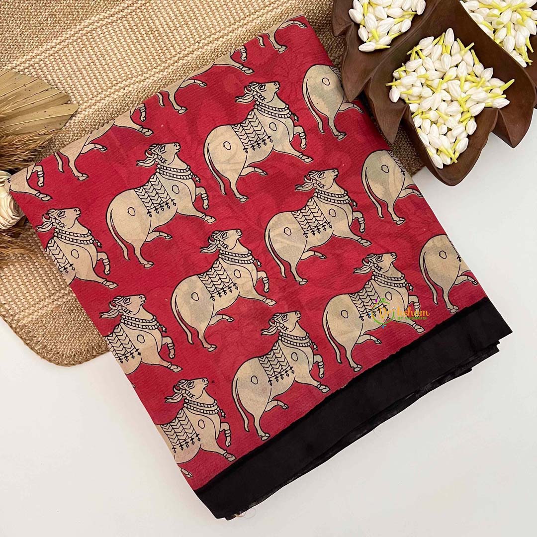 Vriksham Tomato Red Dynamic Running Cow Motifs Printed With Black Border Kalamkari Saree-VS5008