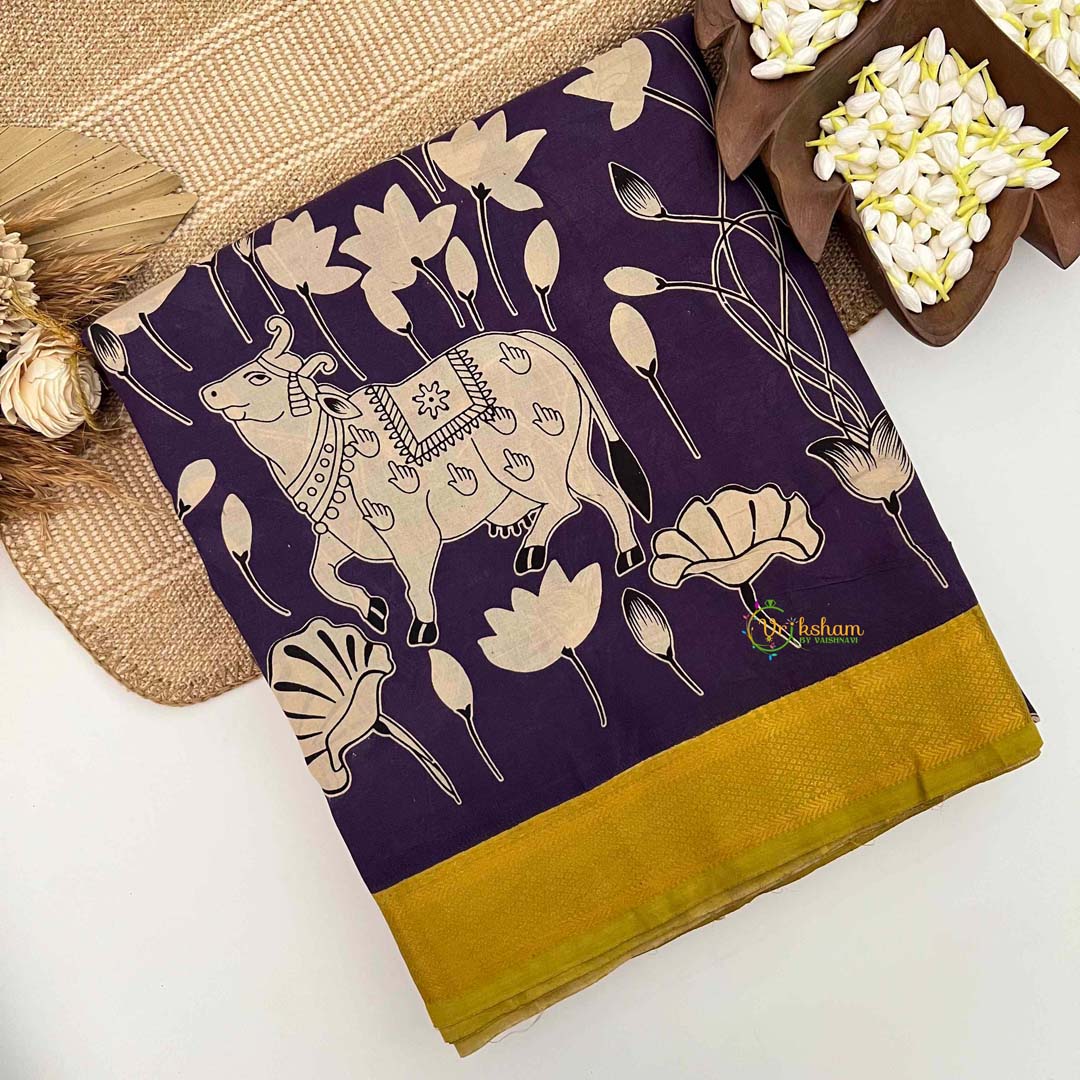 Vriksham Deep Indigo Kamadhenu & Floral Printed With Golden Zari Nizam Border Kalamkari Saree-VS5007