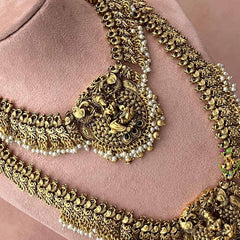 Vriksham Peacock Feather Nakshi With Lakshmi Pendant Pearls Detailing Bridal Set-G21063