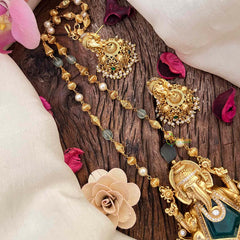 Vriksham Exquisite Matte Gold Lord Ganesha With Handcrafted Floral Jhumkas & Emerald Accents-G21834