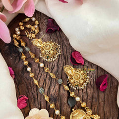 Vriksham Exquisite Matte Gold Lord Ganesha With Handcrafted Floral Jhumkas & Emerald Accents-G21834